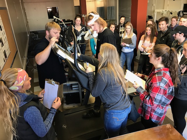 students experimenting on treadmill