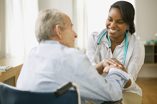 docotr talking with elderly patient